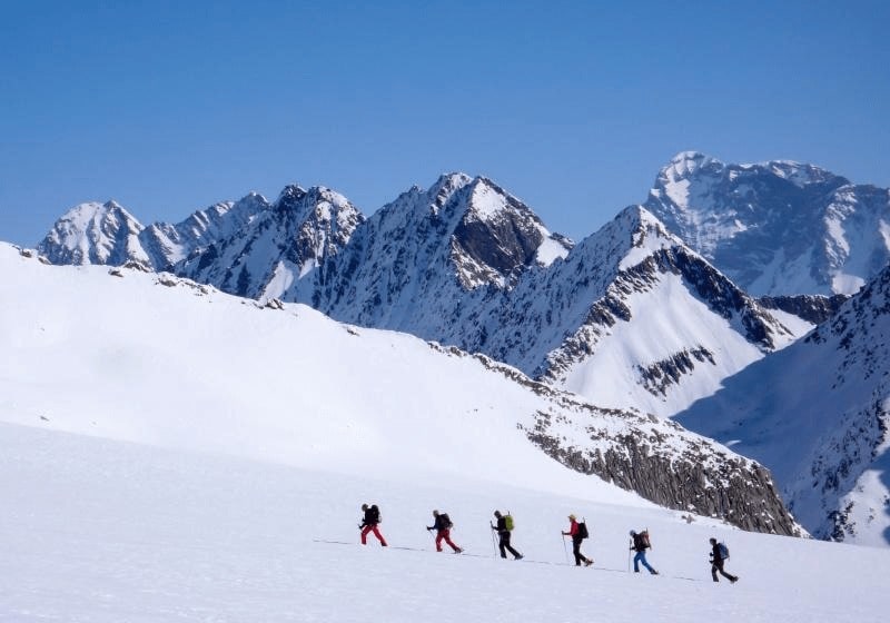 KT - People hiking on snow mountain