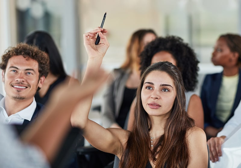 KT - Woman asking question in a seminar